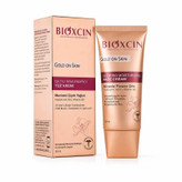 كرم پودر مرطوب كننده و براق كننده لومی گلوشن بيوكسين Bioxcin مدل Gold On Skin حجم 50 ميل